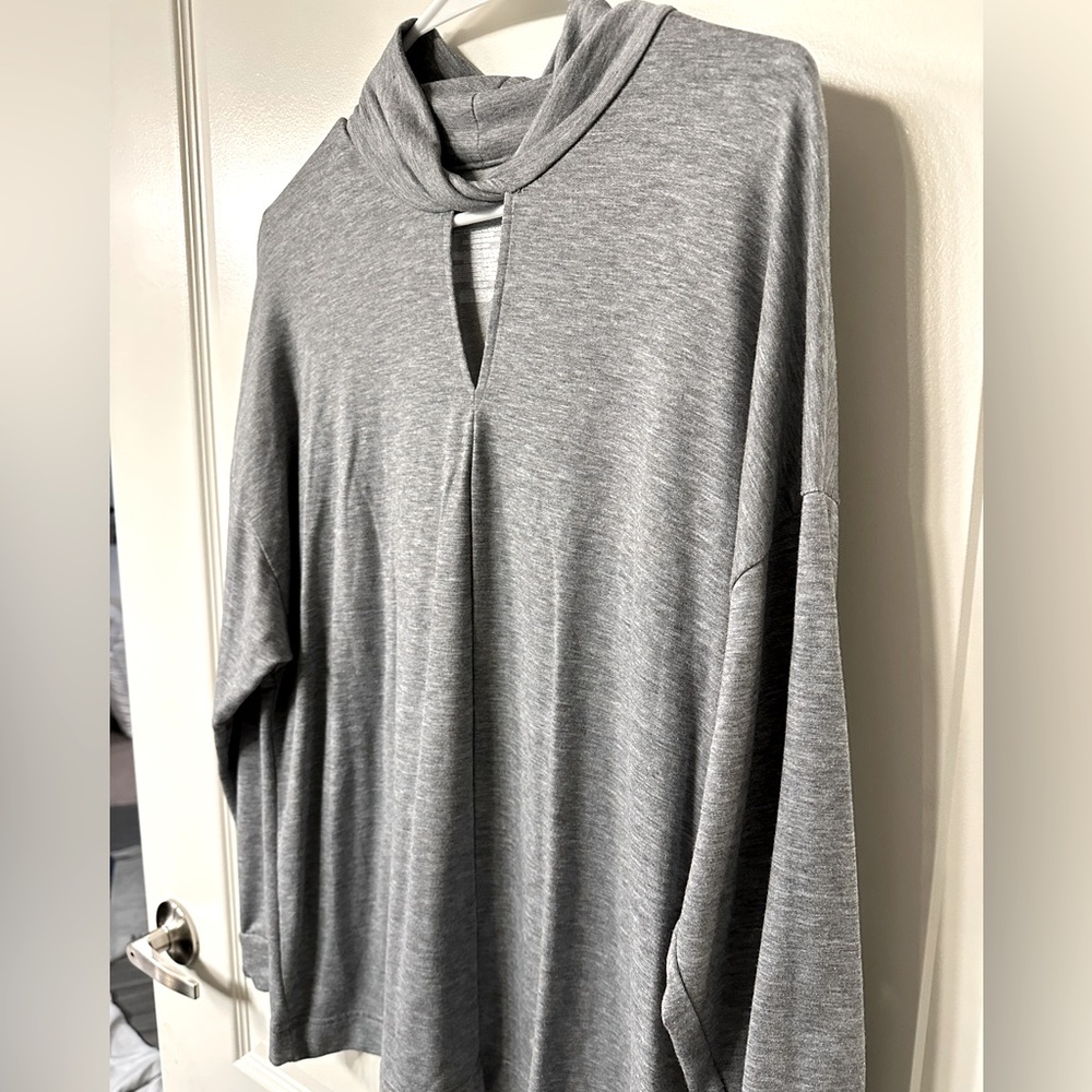 Gray long sleeved top